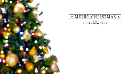 Merry Christmas and Happy New Year greeting card, blurred background of the twinkling lights of the...