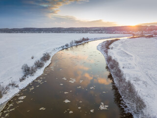 Beautiful winter landscape, sunset over the Dnipro river, view from the drone