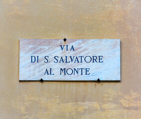 Obraz premium Via di S. Salvatore al Monte , street sign on the wall in Florence, Italy