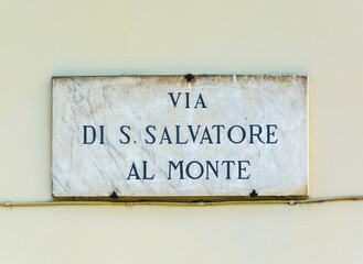 Via di S. Salvatore al Monte , street sign on the wall in Florence, Italy