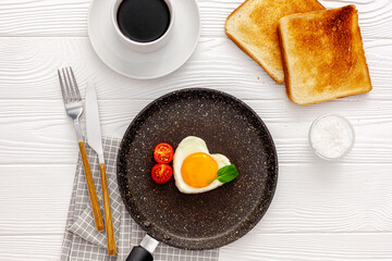 Breakfast on Valentine's Day Heart shape fried egg