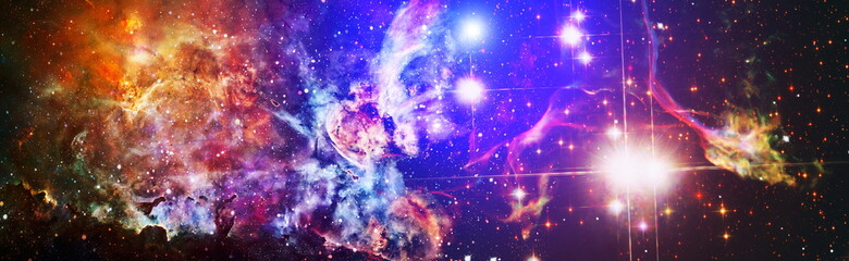 Colorful cosmos with stardust and milky way. Magic color galaxy. Infinite universe and starry...