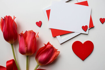 happy valentine's day greeting card mockup. bouquet of red tulips, red heart and space for text