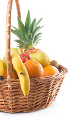 Fresh fruit in the basket on white background