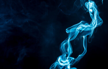 Blue smoke isolated on black background.
