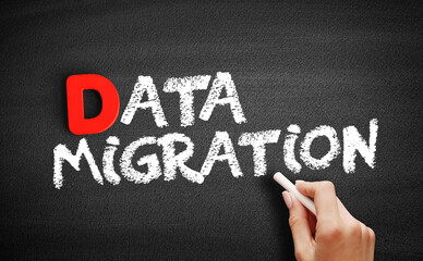 Data Migration text on blackboard, technology concept background