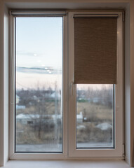 Window in the room at home as a background. Winter
