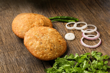 Kachori is a spicy snack from India also spelled as kachauri and kachodi. Served with tomato ketchup. Favorite Tea time snacks