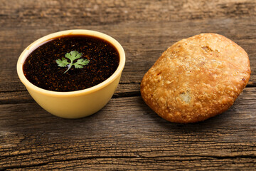 Kachori is a spicy snack from India also spelled as kachauri and kachodi. Served with tomato ketchup. Favorite Tea time snacks