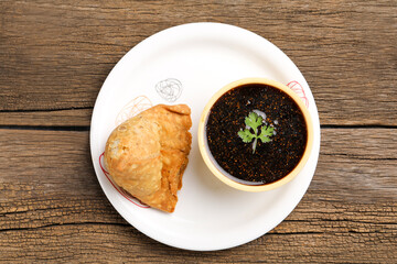 Kachori is a spicy snack from India also spelled as kachauri and kachodi. Served with tomato ketchup. Favorite Tea time snacks