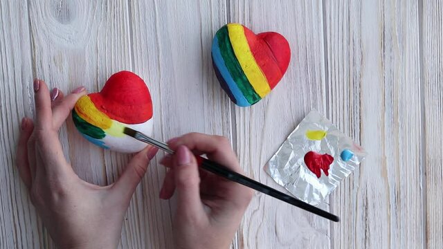 Decorate handmade hearts in rainbow colors, symbol of free love, lgbt concept
