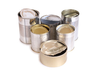 Heap of old empty cans on a white background. Isolated objects