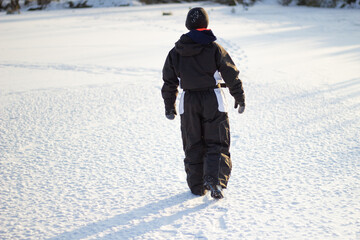 Fototapeta na wymiar a person walking in the winter