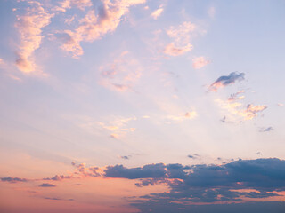 Pink, blue and purple clouds sunset sky. Abstract nature background. Sunset Glow Evening Scene. Pastel soft colorful smooth blurred sky. Romantic sunrise.