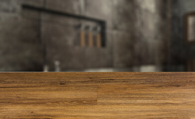 The bathroom is made of dark tiles on the walls under the metal. Bronze washbasin and bath.. 3D rendering,. Abstract blur phototography. wooden table on blurred background.