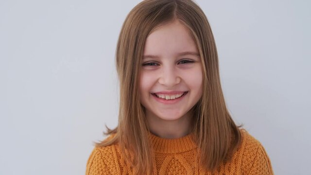 Portrait of Smiling little girl, looking at camera