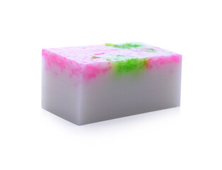 Delicious green jelly cube on white background