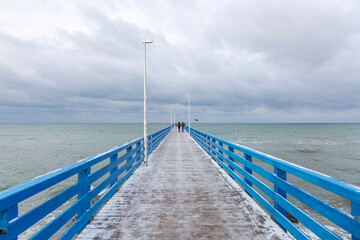 Naklejka premium Winter seascape with Baltic Sea waters, horizon and cloudy sky in Kaliningrad region, Russia