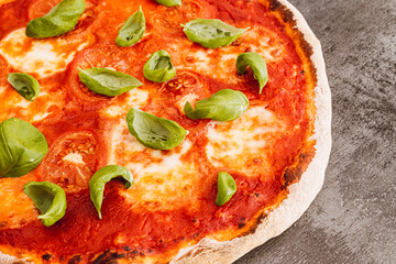 Pizza margherita on dark background. Traditional italian pizza