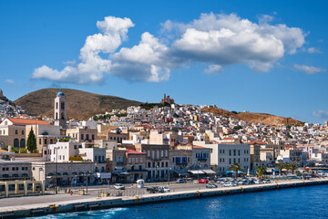 Fototapeta na wymiar Ermoupoli town, Syros island, Greece, orthodox church of Resurrection of Christ, colorful houses, summer sun, vacation, getaway. Mediterranean sea.