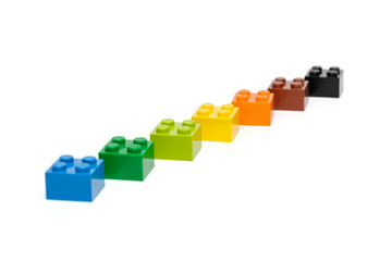 Multi-colored plastic building blocks. Toys and games.