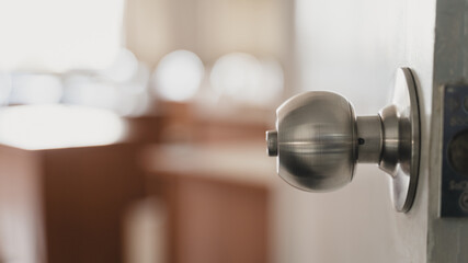 Close-up shot of a dirty doorknob. The doorknob is being found that caused the COVID-19 infection.