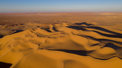 Fototapeta na wymiar Aerial view of Libyan desert at the intersection of the Libyan, Tunisian and Algerian borders