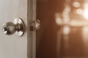 Close-up shot of a dirty doorknob. The doorknob is being found that caused the COVID-19 infection.