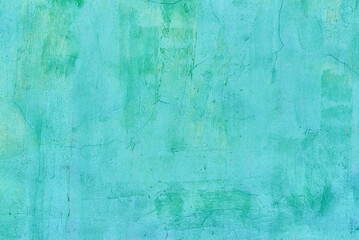 the texture of a bright green old wall, covered with cracks and scratches. watercolor background