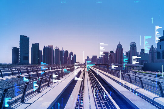 The way towards skyscrapers by modern futuristic train. Tech railway delivers commuters to the financial downtown of Dubai. International business hub. Traffic concept. FOREX graph. Double exposure