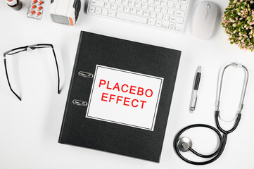 Doctor's workspace, in the center is a folder with the inscription: placebo effect