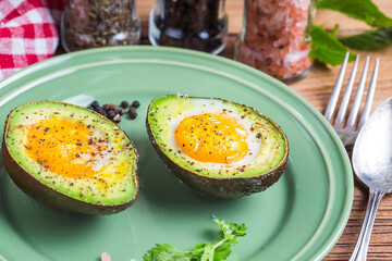 homemade organic egg baked avocado with salt pepper