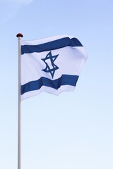 Flag of Israel waving in the sky