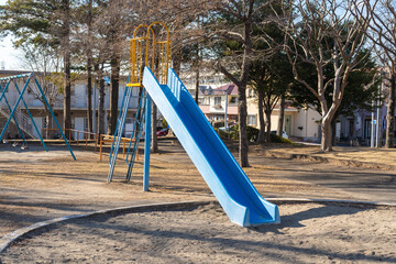 Playground equipment: slide in a rural park, Japan