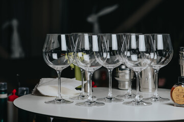 Ice in a glass of wine prepared for a special cocktail for a bartender's bar or restaurant.