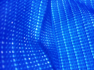 Tela azul arrugada. Textura. Abstracta