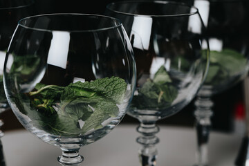Ice in a glass of wine prepared for a special cocktail for a bartender's bar or restaurant.