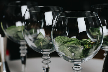 Ice in a glass of wine prepared for a special cocktail for a bartender's bar or restaurant.