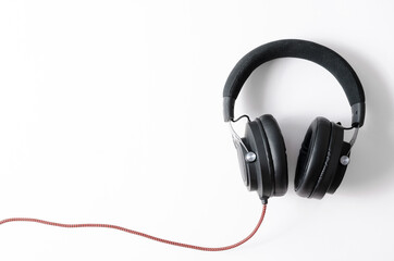 Computer composition. Consists of headphones on a white background. Top view, flat sunbed, space for text.