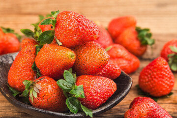 bunch fresh strawberries wooden board background (6)