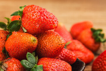 bunch fresh strawberries wooden board background (4)