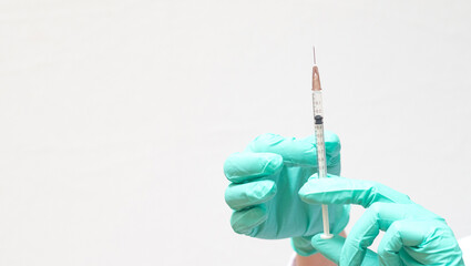 World immunization week and International HPV awareness day vaccine concept. Vaccination for COVID-19, influenza or flu shot or HPV prevention with syringe by nurse or medical officer.