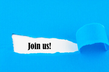 Join us - message appearing behind torn brown paper. Hiring and new job concept