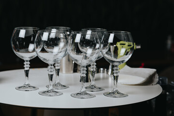 Background image with bartender prepared glasses for champagne cocktail on a table in bar or restaurant.