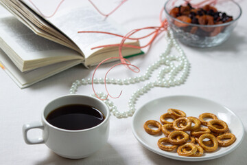 Light breakfast. Morning tea. Tea with dessert. Breakfast on a white tablecloth.