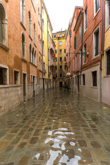 Venice, Italy - 1 November 2018: acqua alta, view on a street has been flooded by waters rising 156 cm