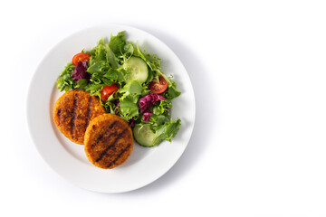 Delicious healthy chickpea burger and salad isolated on white background