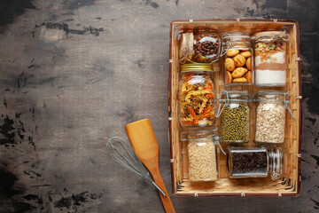 Products food in jars in a gift basket. Top view. Donation concept. Zero waste