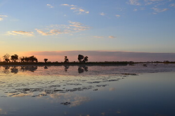 Fototapeta na wymiar African sunset reflection