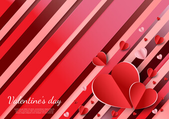 Valentine's day background. Hearts pink and red papaer cut card on diagonal red background with space for text.